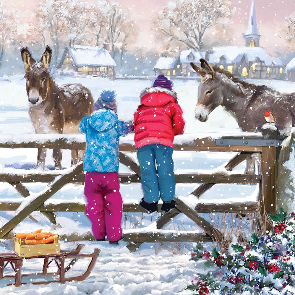 Two_Children_feeding_carrots_to_two_donkeys_in_the_snow_Christmas_card