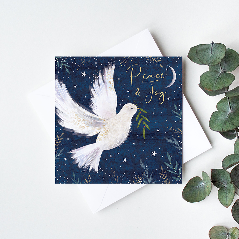 An_illustrated_dove_with_a_sprig_of_holly_in_a_moonlit_sky_card_design