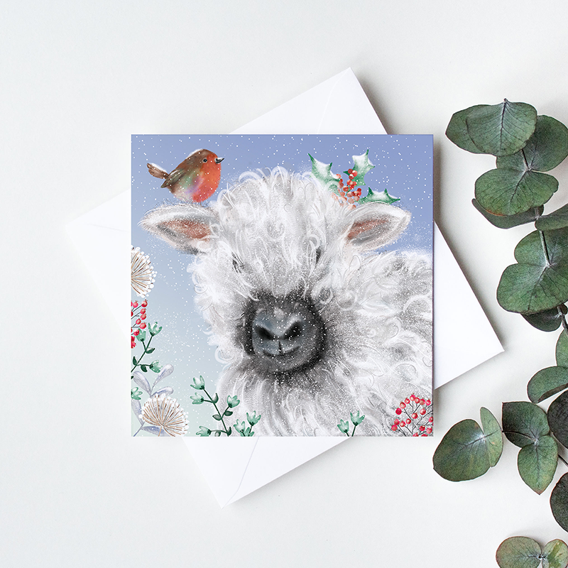 an_illustrated_robin_and_highland_cow_in_the_snow_card_design