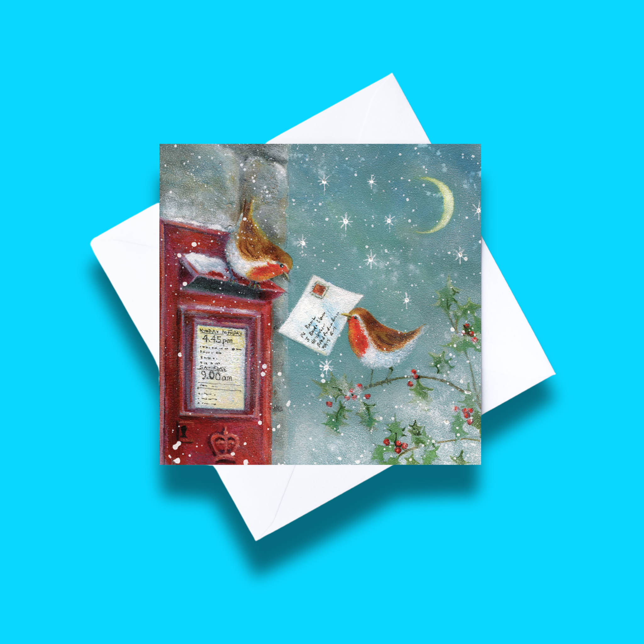 Special delivery Christmas card with white envelope on a blue background. Card design features two robins posting a letter in a red postbox.