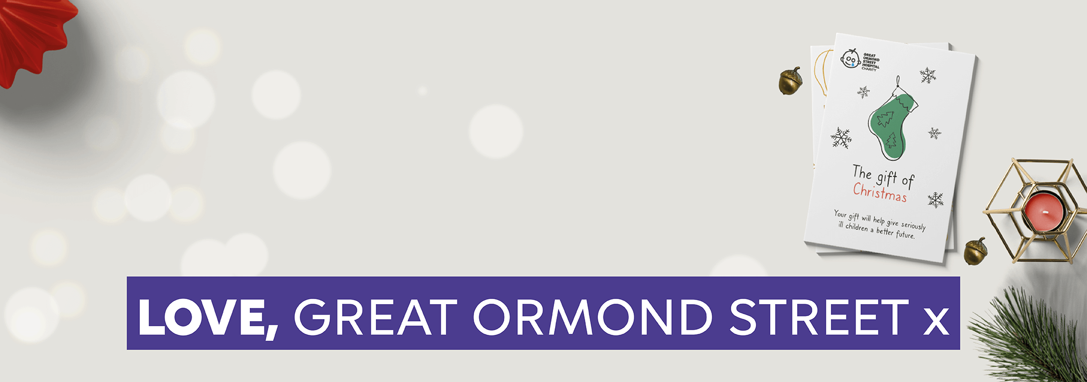 love_great_ormond_street_charity_gift_cards_on_christmas_background